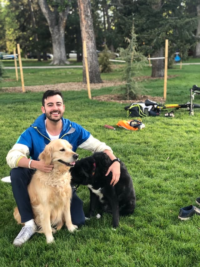 Ben with two dogs in park